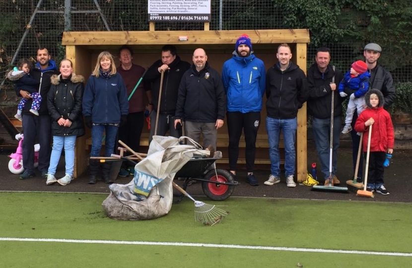 volunteers tidy up graveshams astro pitch