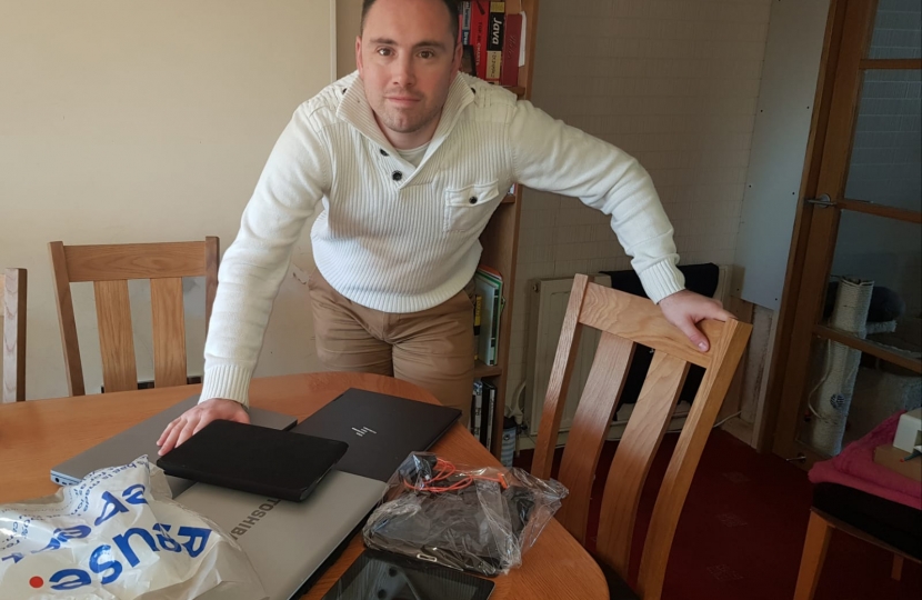 Cllr. Elliott with his last hoard of laptops