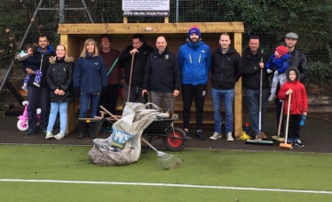 volunteers tidy up graveshams astro pitch