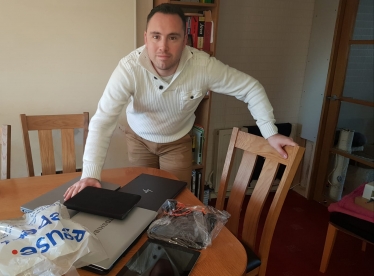 Cllr. Elliott with his last hoard of laptops